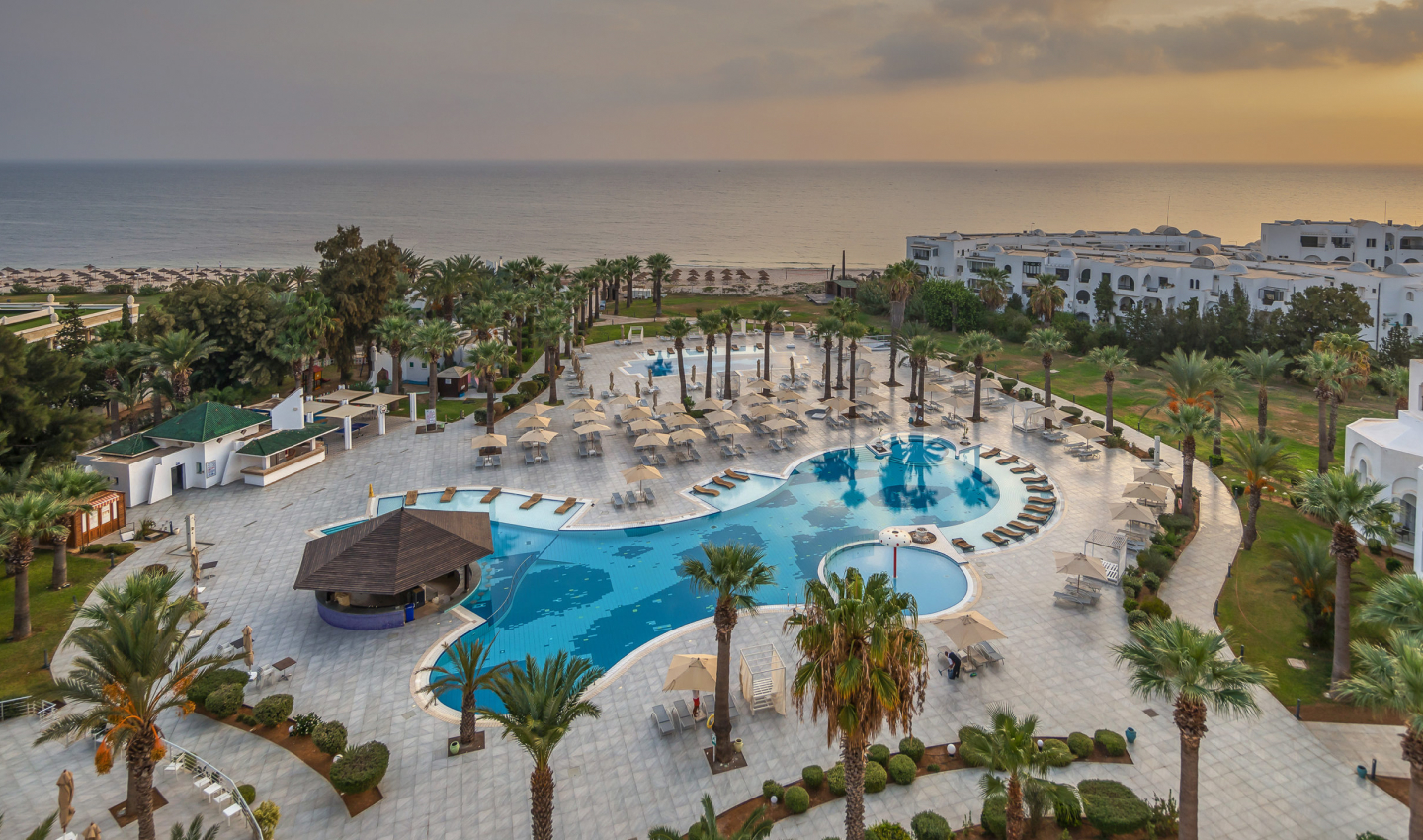 A coastal resort and its gardens viewed from above